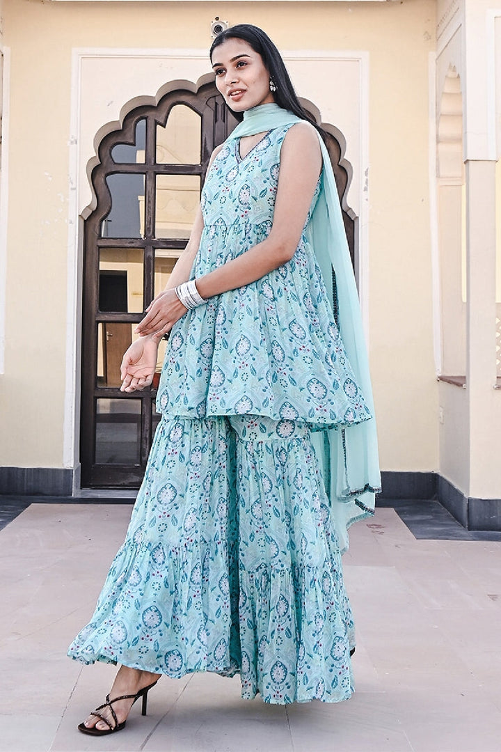 Ruhaani Printed Blue Sleeveless Sequins Flared Kurta With Sharara & Dupatta