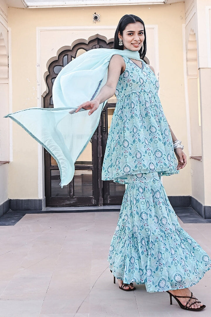 Ruhaani Printed Blue Sleeveless Sequins Flared Kurta With Sharara & Dupatta