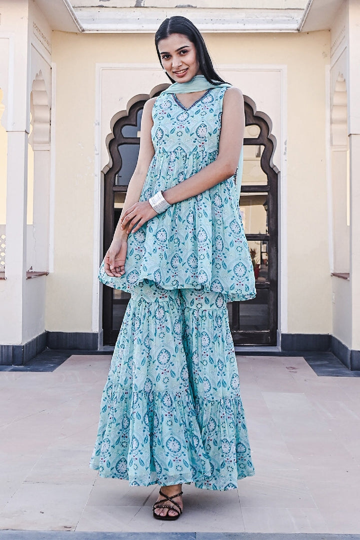 Ruhaani Printed Blue Sleeveless Sequins Flared Kurta With Sharara & Dupatta